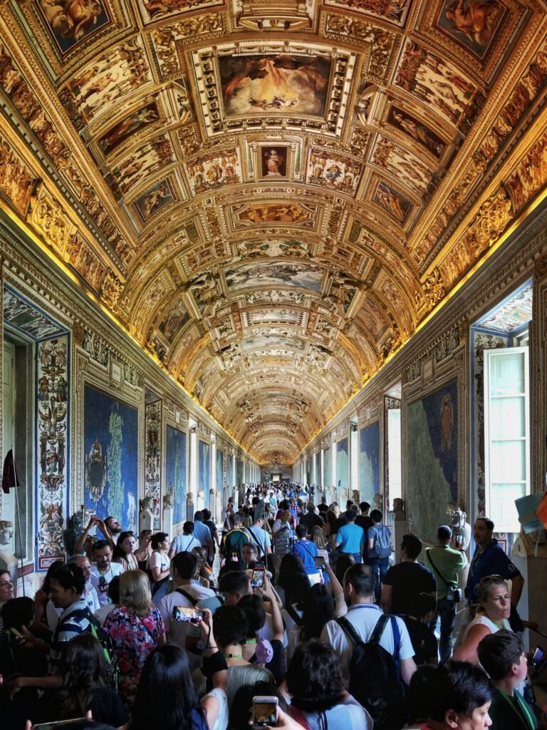 Crowded Gallery of Maps inside Vatican Museums at 1:30 PM, timed entry for cruise passengers from Civitavecchia doing Colosseum and Vatican in one day